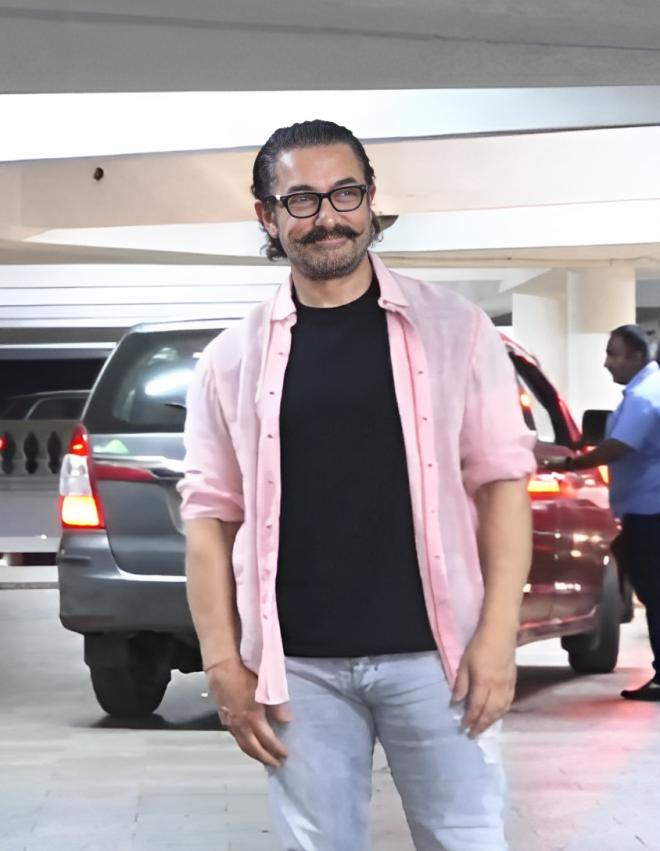 Aamir Khan's presence resonated with timeless elegance as he stepped out, maintaining his understated charm.